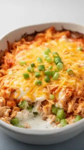 Delicious Buffalo Chicken Cheese Bake served hot, topped with melted cheese.